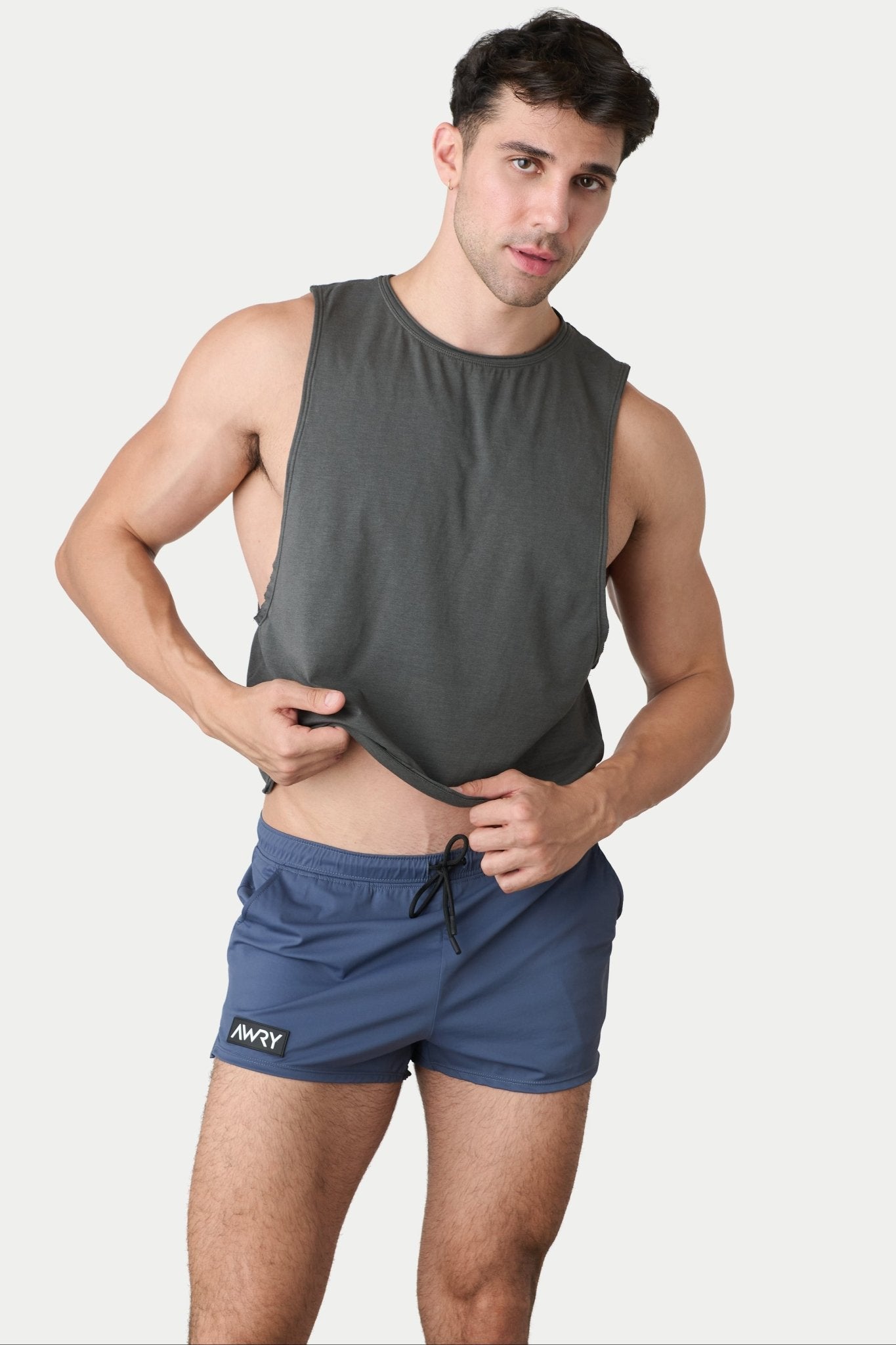 Awry Raw Crop Tank Charcoal — side view showing cropped midriff-exposing silhouette