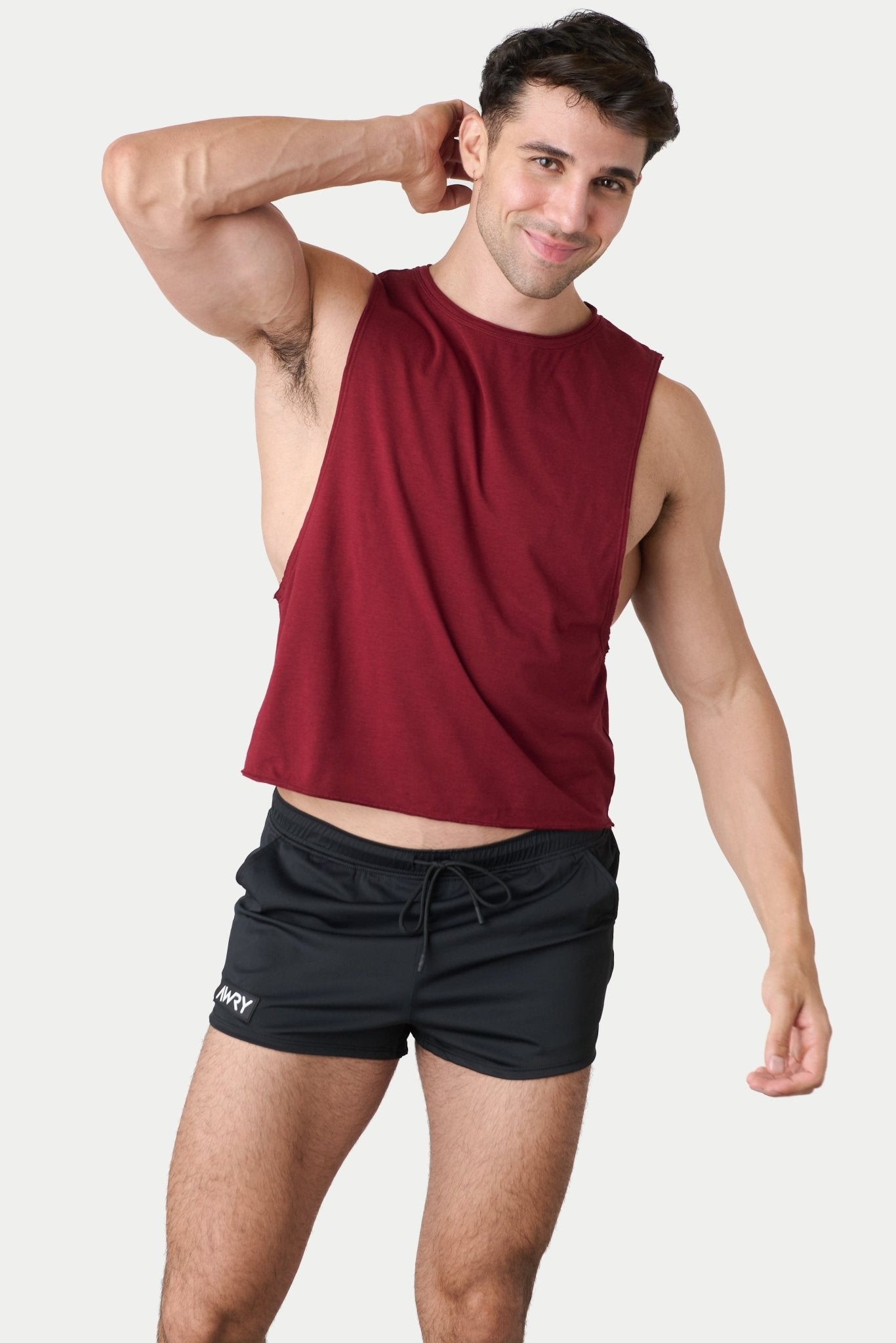 Awry Raw Crop Tank Maroon — side view showing cropped midriff-exposing silhouette
