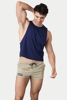Awry Raw Crop Tank Navy — side view showing cropped midriff-exposing silhouette