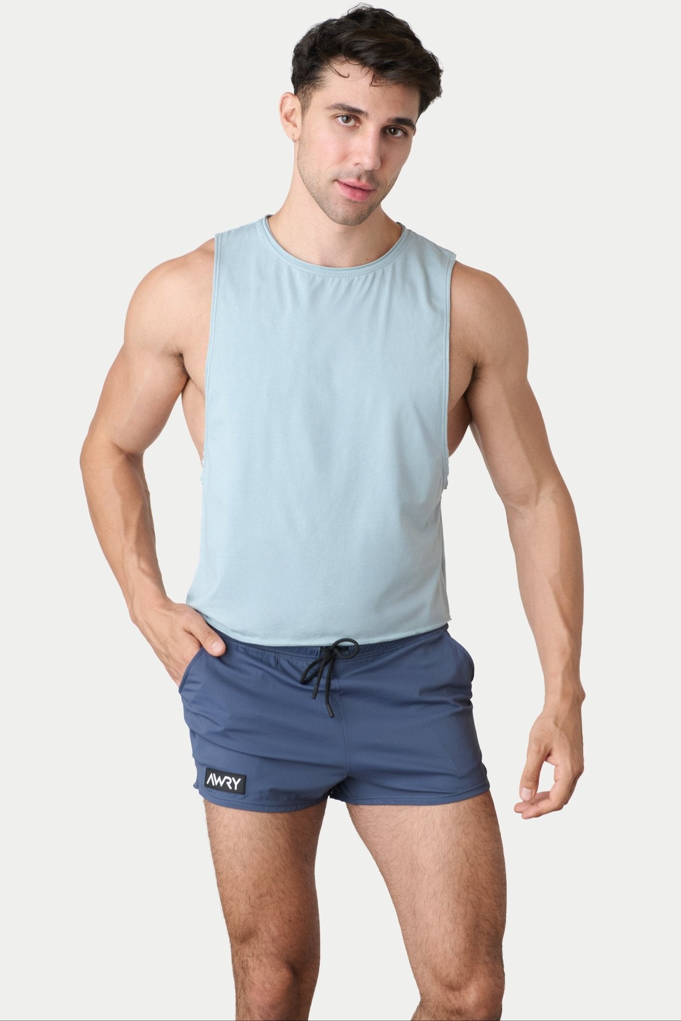 Awry Raw Crop Tank Soft Blue — men's cotton-modal activewear crop tank with raw edges, front view