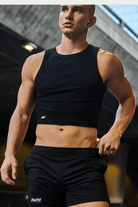 Awry Ribbed Crop Tank Black — lifestyle view showing versatility for gym and going out