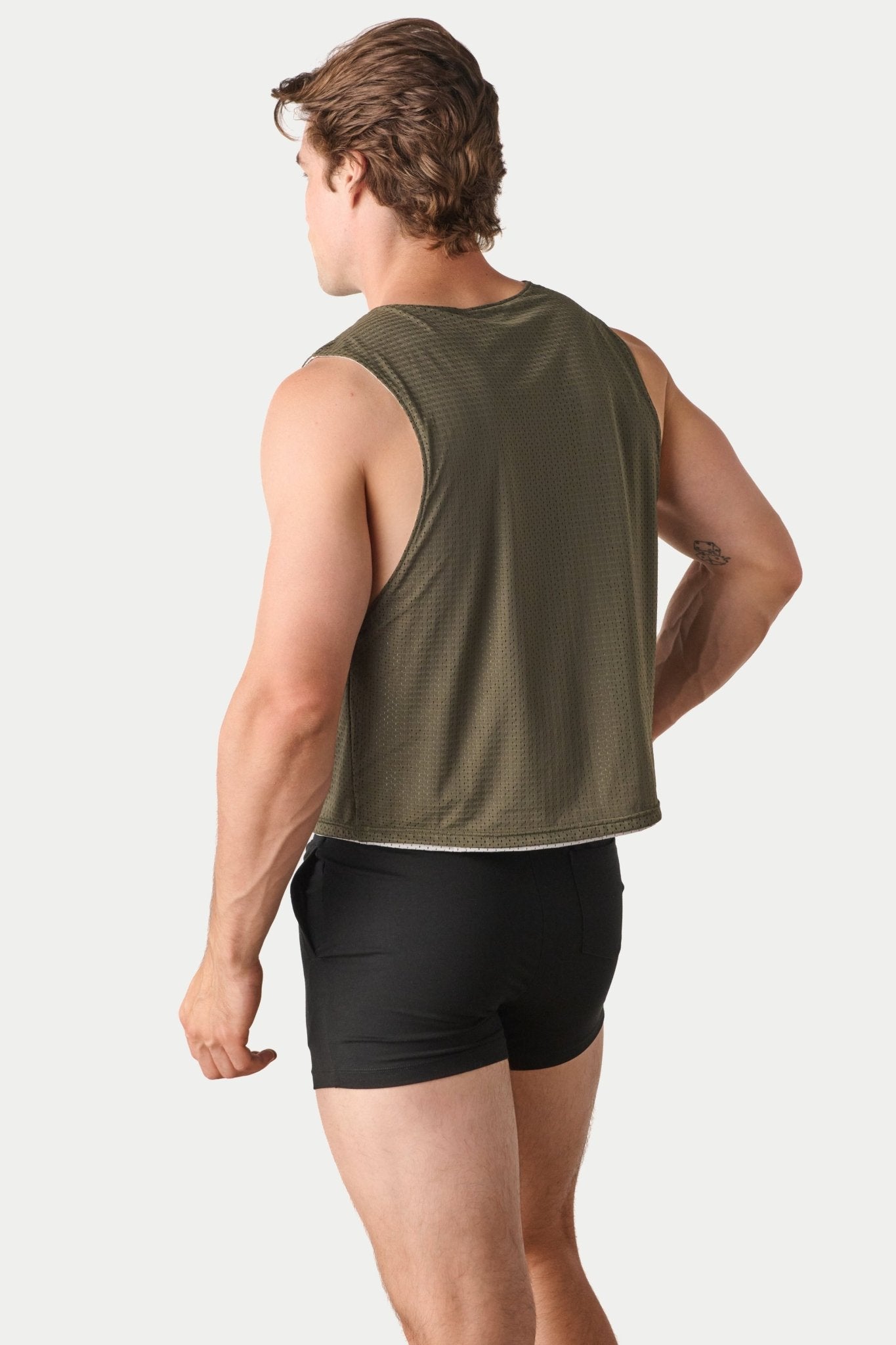 Awry Rookie Reversible Tank Army Green & Gray — side view showing semi-cropped silhouette and mesh construction