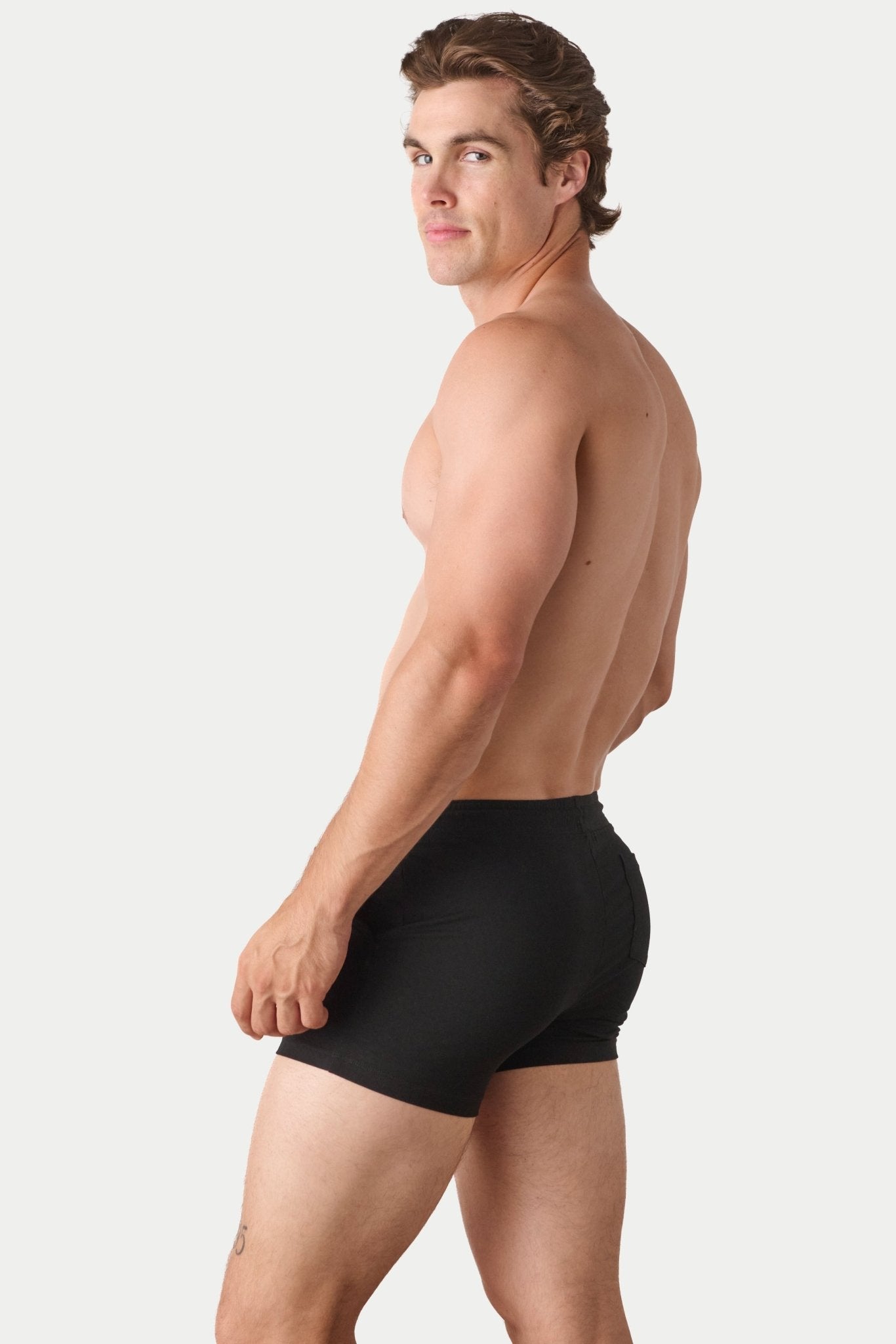 Awry Vers Short V2.1 Black — side view showing roomy front pocket and drawstring waistband