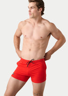 Awry Vers Short V2.1 Red — detail of logo patch and molded aglets on improved drawstring