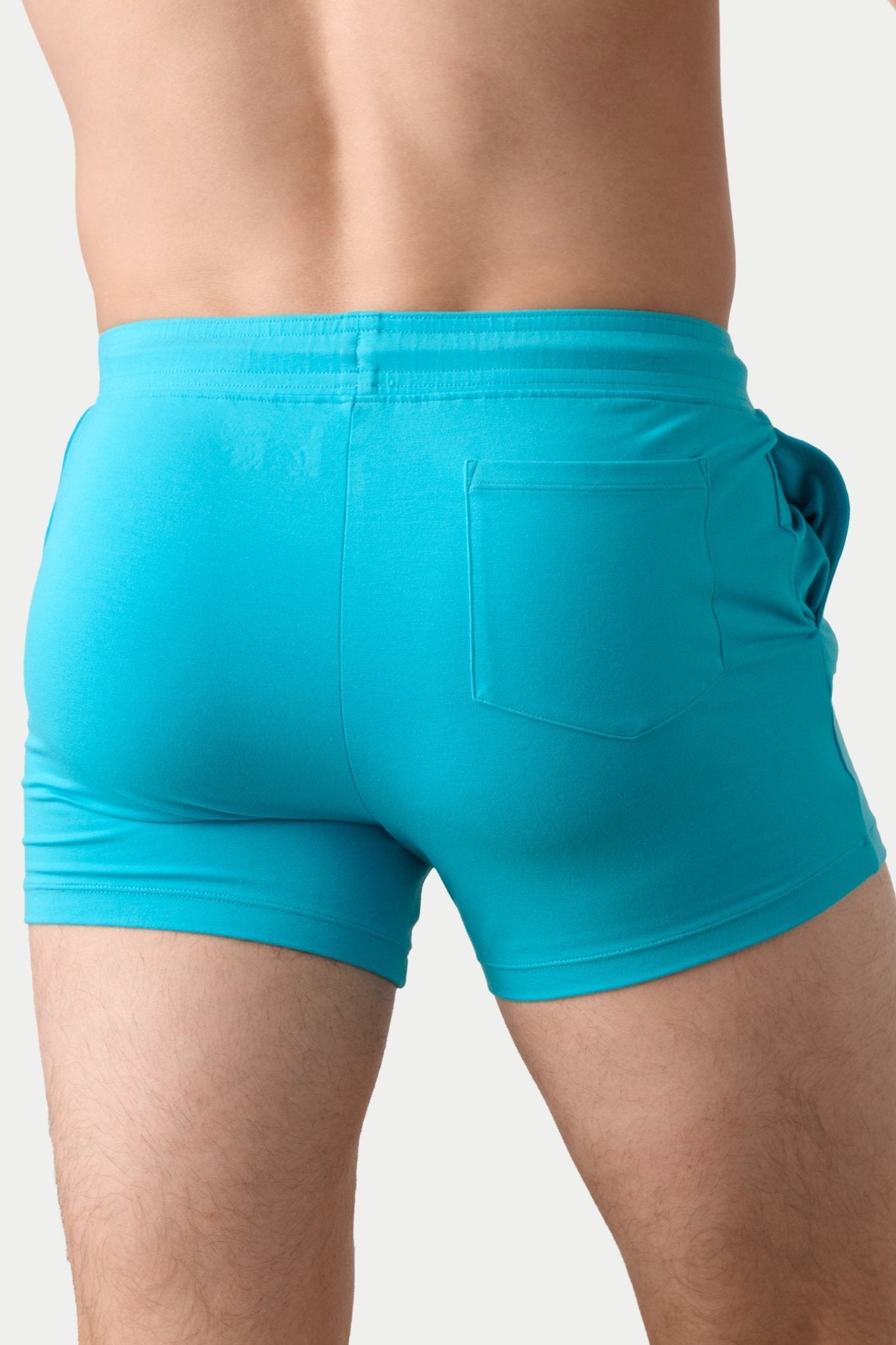 Awry Vers Short V2.1 Sky Blue — side view showing roomy front pocket and drawstring waistband
