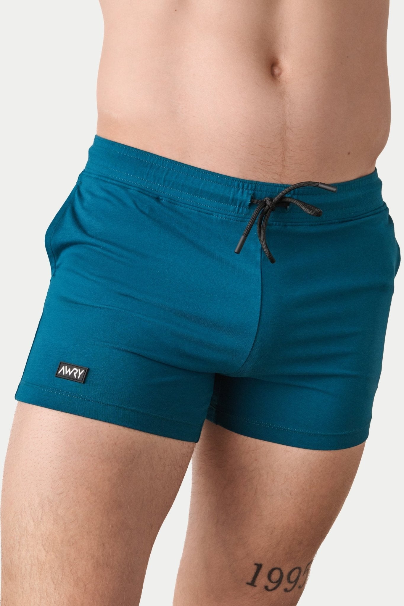 Awry Vers Short V2.1 Teal — men's bamboo athletic short, front view showing form-fitting 4-inch inseam